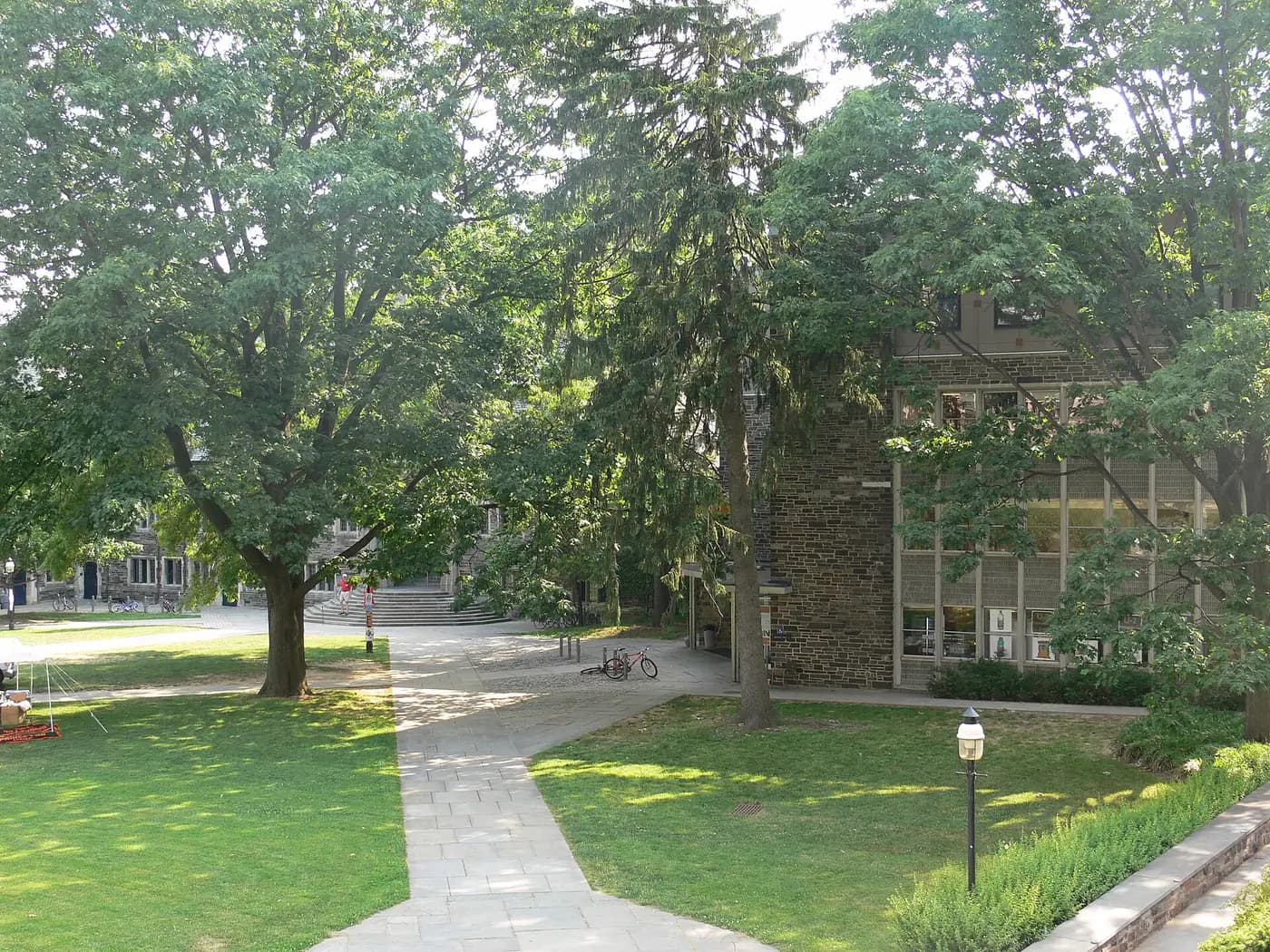 Stone academic buildings and paths near University Place on Princeton’s campus