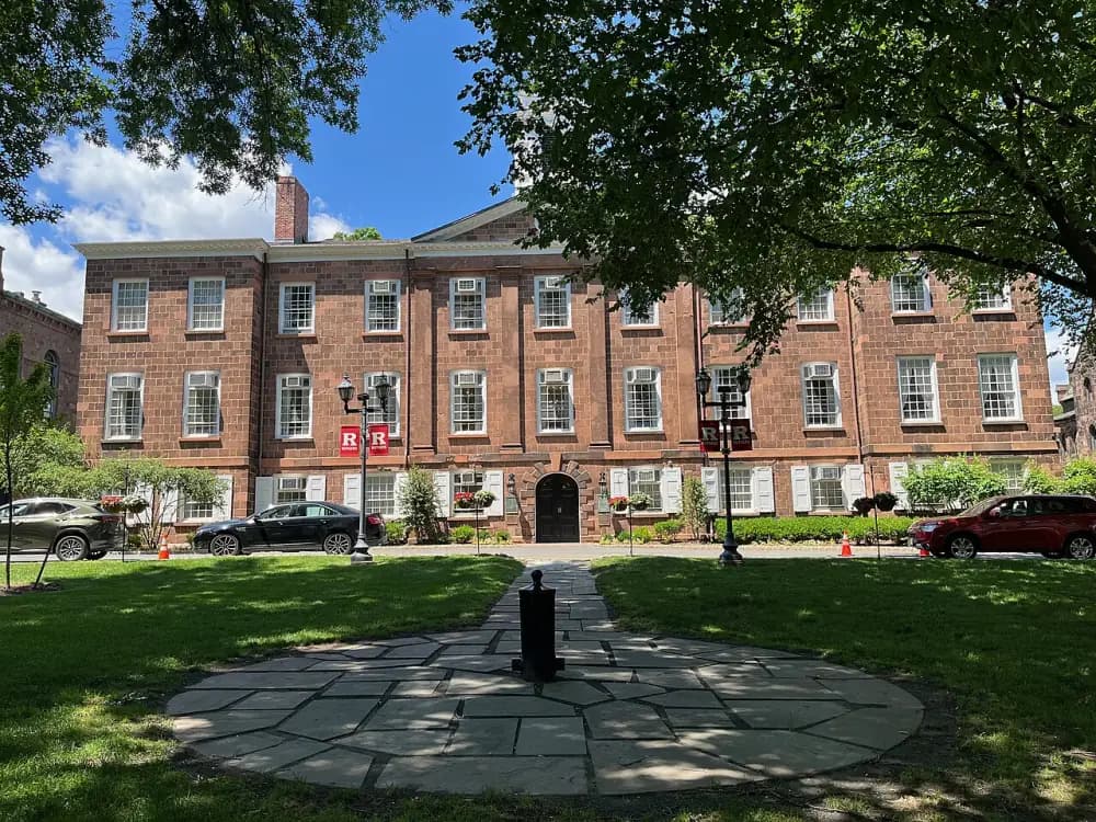 Historic stone buildings and lawn on Rutgers’ Queens Campus in New Brunswick